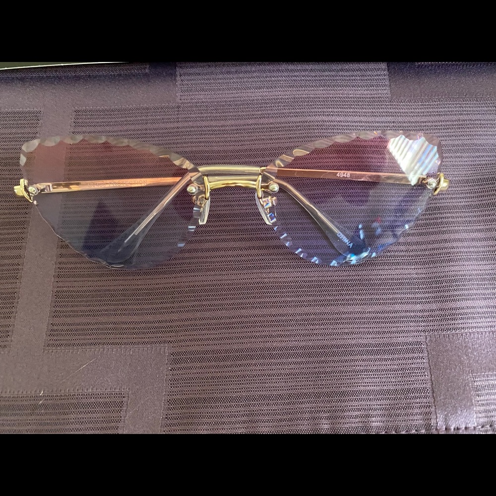 Cat eye pink/purple tinted sunglasses